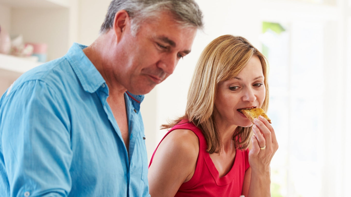 Middle age couple sitting at home